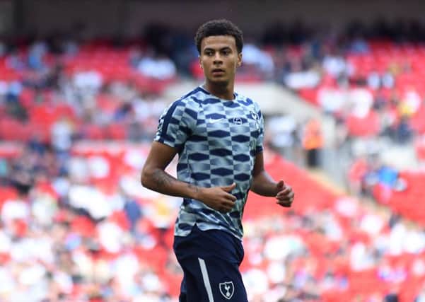 England and Tottenham star Dele Alli, who is wanted by Real Madrid, according to today's football transfer grapevine.