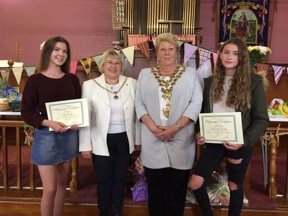 Chatsworth Road Festival photographic competition winner  Amy Bradley, mayoress Mrs Liz Archer, mayor Councillor Maureen Davenport and competition runner-up Anna Hope-Connelly.
