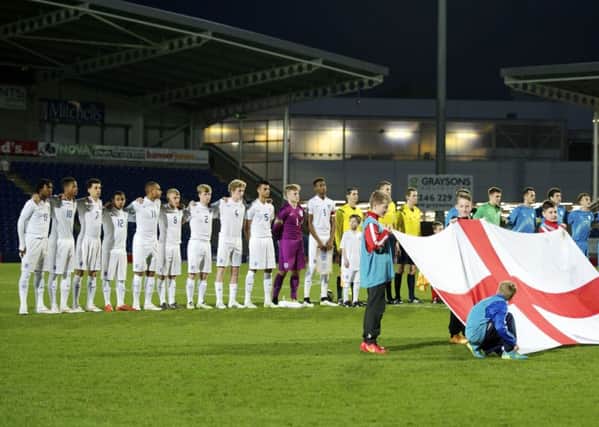 England v Slovenia
The cross of St George is displayed as the national anthemm is sung at Chesterfields Proact Stadium


Picture by Dean Atkins