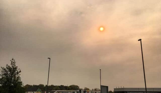 Dust from Africa has turned the sky yellow giving a sepia tinge to the world today. Picture Ashley booker