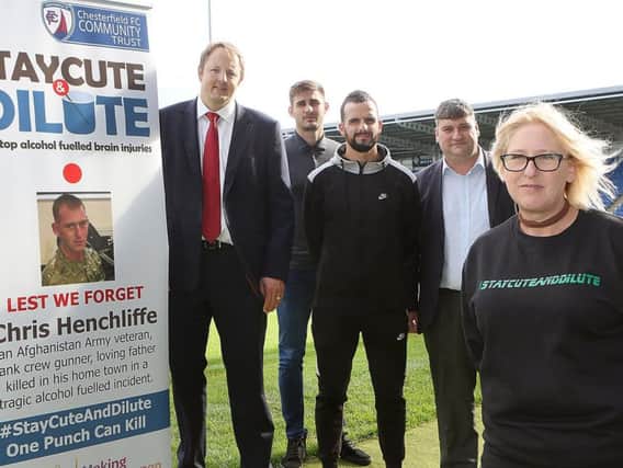 Yvonne Henchliffe with MP Toby Perkins, Spireites' players Joe Anyon and Robert Weir and John Croot of the Chesterfield FC Community Trust. Picture by Jason Chadwick.