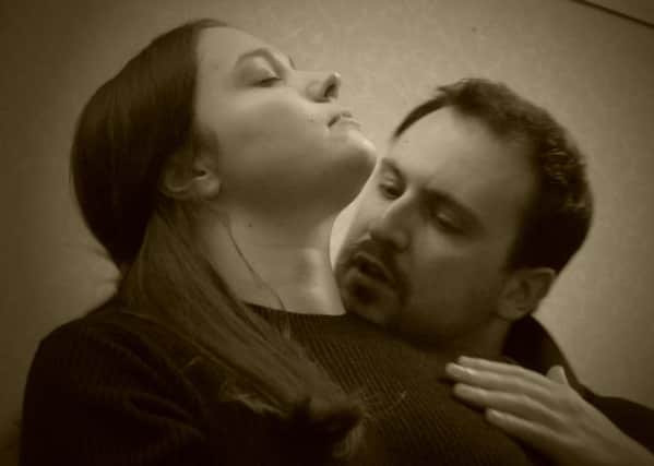 Megan Davies as Lucy and Alastair Massey as Dracula in Buxton Drama League's presentation of Dracula.