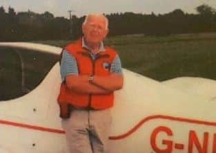 Pilot, Bryan Allsop with his plane, Dolly.