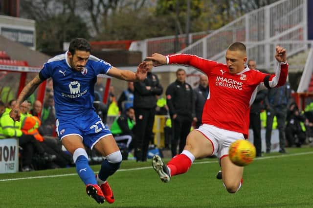 Picture by Gareth Williams/AHPIX.com; Football; Sky Bet League Two; Swindon Town v Chesterfield FC; 11/11/2017 KO 15.00; The Energy Check County Ground; copyright picture; Howard Roe/AHPIX.com; Bradley Barry fires in a cross despite the attentions of Luke Norris