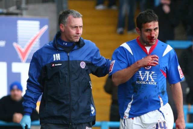 Physio Jamie Hewitt looks after Jack Lester who had his nose broken against Accrington Stanley  by Tina Jenner  CHESTERFIELD v ACCRINGTON STANLEY  22nd March 2008