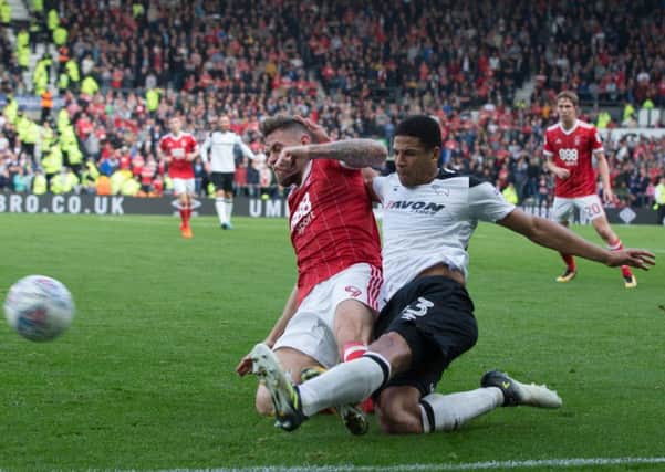 Derby County vs Nottingham Forest - Curtis Davies of Derby County battles with Daryl Murphy of Nottingham Forest - Pic By James Williamson