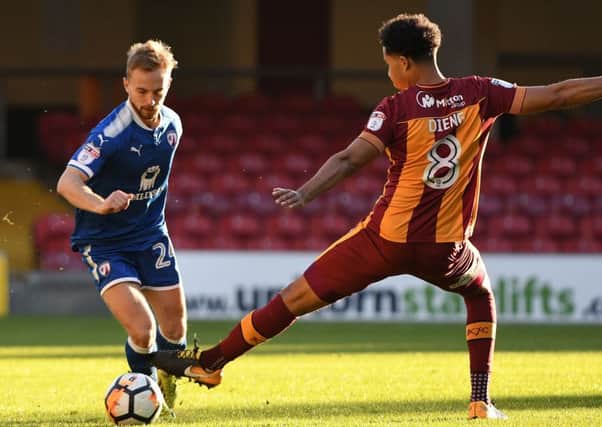Picture Andrew Roe/AHPIX LTD, Football, The Emirates FA Cup First Round, Bradford City v Chesterfield, Northern Commercials Stadium, 04/11/17, K.O 3pm

Chesterfield's Andy Kellett beats Bradford's Timothee Dieng

Andrew Roe>>>>>>>07826527594
