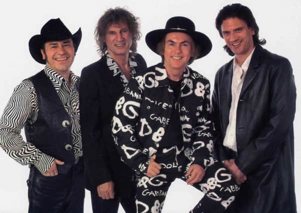 Slade are, from left, Mal McNulty, Don Powell, Dave Hill and John Berry.