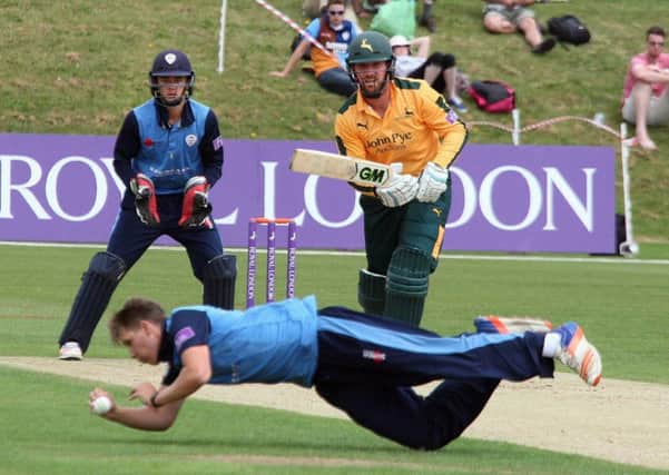 A brilliant diving stop off his own bowling by Derbyshire all-rounder Matt Critchley for Derbyshire. (PHOTO BY: Eric Gregory)