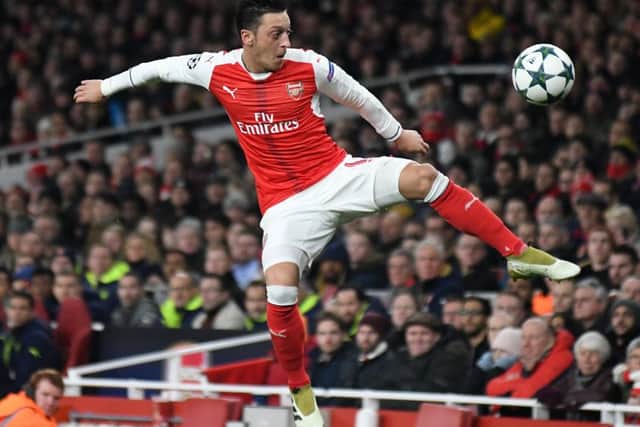 Mesut Ozil, who could yet stay at Arsenal, according to today's rumour mill.