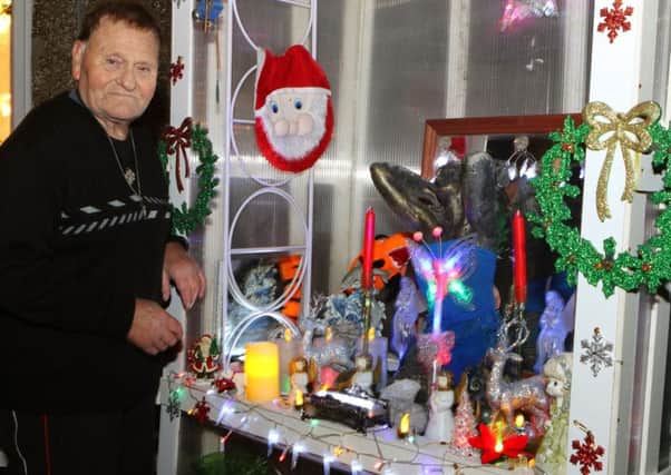 Mick Barbrooks with his controversial front garden display.