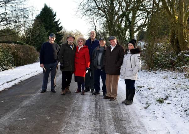Residents of Troway are angry that the roads in their villiage have not been gritted sufficiently, picture includes Eric Maskety, Archie Hull, Tina Hull, John Plant, Coun Andy Dye, Gloria Havenhand and Alan York