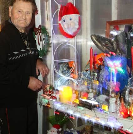 Mick Barbrooks with his controversial front garden display