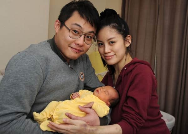 Eilyn Chan with her partner Alvin Yap and Christmas Day baby Anya.