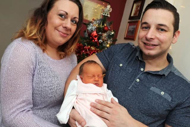 Christmas Day baby Ella Rose Blackburn with her parents Sarah Baker and Matthew Blackburn.