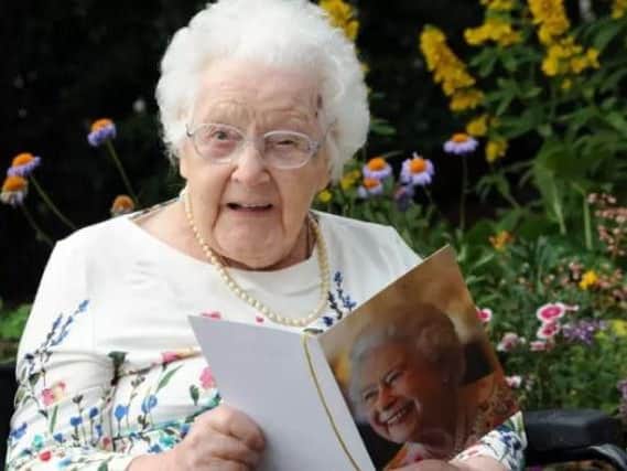 Effie Potter with her card from the Queen as she celebrated her 107th birthday.
