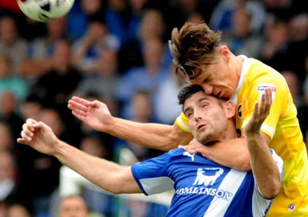 Chesterfield v Millwall.
Ched Evans gets some unwanted attention from Sid Nelson in the second half.