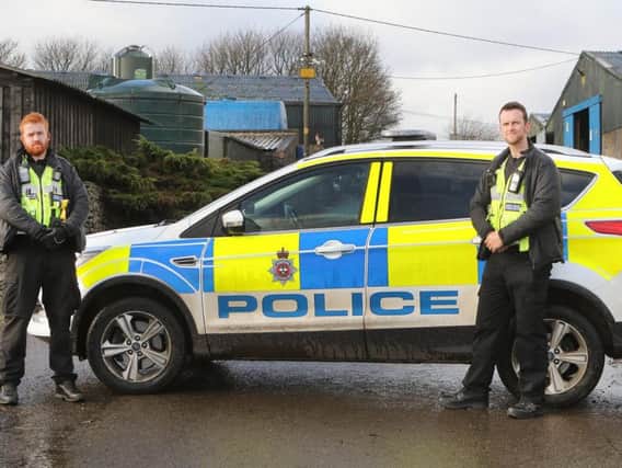 PCs Andy Shaw and James Bowler from the rural crime team.