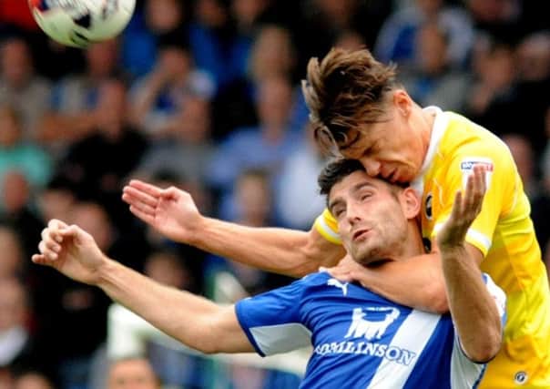 Sid Nelson gets close to Ched Evans while playing for Millwall against Chesterfield in August 2016
