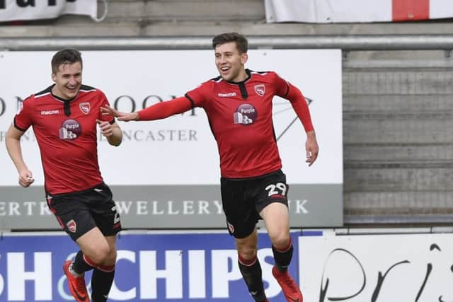 MorecambeÃ¢Â¬"s Callum Lang celebrates scoring the opening goal: Picture by Steve Flynn/AHPIX.com, Football: Skybet League Two match Morecambe -V- Mansfield Town at Globe Arena, Morecambe, Lancashire, England on copyright picture Howard Roe 07973 739229