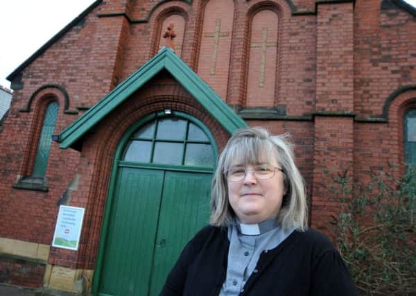 The Rev. Ann Anderson outside Grassmoor Methodist Church which has been restored thanks to volunteers from the community.

(For Gay)