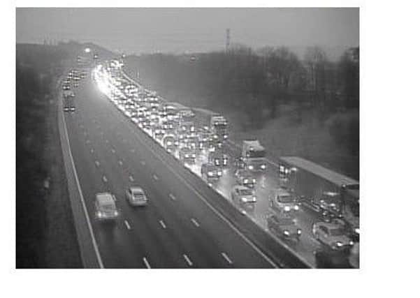 A Highways England traffic camera shows traffic has come to a standstill close to Tibshelf Services.