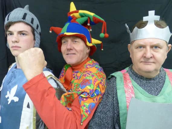 Matthew Bowers as Justin Thyme, Peter Stubbington as Lester the Jester and Tim Warburton as King Arthur in Buxton Drama League's production of Knight Fever.