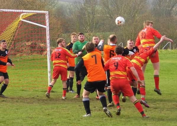 Goalmouth action from the Division Six clash between Carr Vale United and Renishaw Rangers. (PHOTO BY: Martin Roberts).