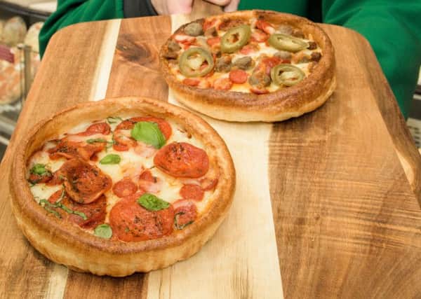EDITORIAL USE ONLY
A Yorkshire Pudding Pizza has been created by Morrisons ahead of Yorkshire Pudding Day on Saturday February 3rd. PRESS ASSOCIATION. Photo. Issue date: Friday February 2, 2018. The cheese and batter hybrid combines a crispy Yorkshire pudding base made in Doncaster in South Yorkshire with a filling of tomato sauce and mozzarella. It will be available in two flavours, 'Pepperoni' and 'Meat Feast' with mini meatballs, pepperoni, spicy beef and jalapeo chillies. The Yorkshire Pudding Pizza is available now in all 491 Morrisons stores for Â£3. Photo credit should read: Anthony Upton/PA Wire