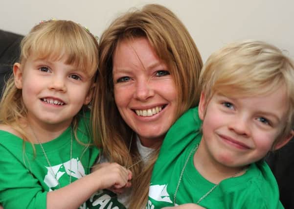 Terri Oakley has been diagnosed with cervical cancer and is urging other women to go and have smear tests. She is pictured with her children, Adriana, 3, and 7 year old Blake.