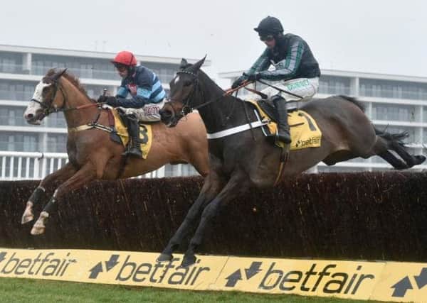 Altior (right) on his way to victory, and a classy comeback, in the Betfair Exchange Game Spirit Chase at Newbury on Saturday.