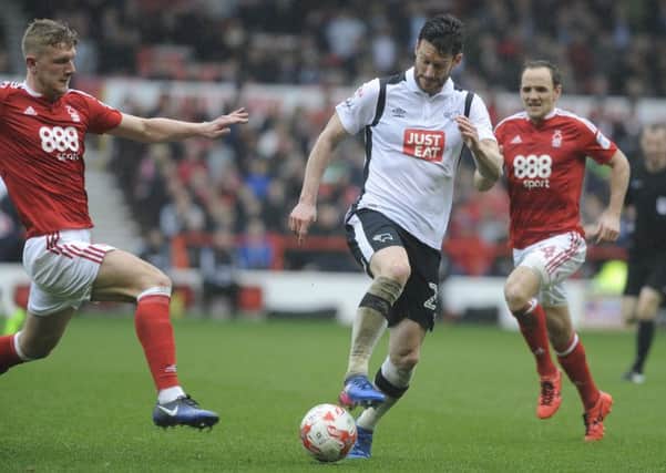 IN PICTURE: Joe Worrall and David Nugent.
SPORT: LEAD: Nottingham Forest v Derby County.  Sky Bet Championship match at the City Ground, Nottingham.  Saturday, 18th March 2017.
MARK FEAR - MARK FEAR PHOTOGRAPHY.  CONTACT markfearphotographer@outlook.com (+44) 753 977 3354