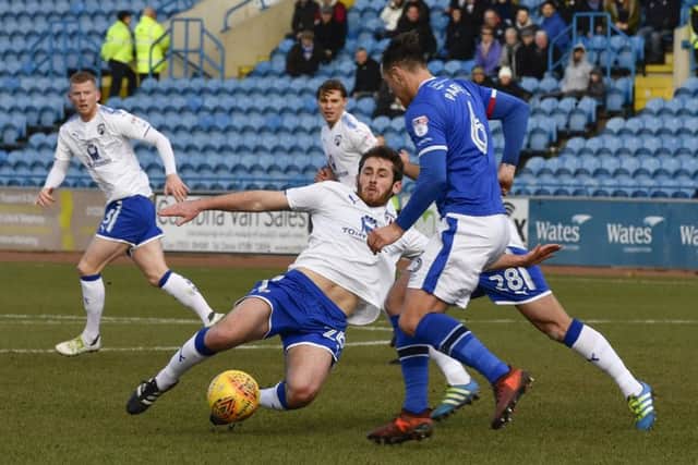 ChesterfieldÃ¢Â¬"s Jak McCourt slides into a tackle: Picture by Steve Flynn/AHPIX.com, Football: Skybet League One match Carlisle United -V- Chesterfield  at Brunton Park, Carlisle, Cumbria, England on copyright picture Howard Roe 07973 739229