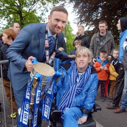 Chesterfield fc victory parade through the town. Ian Evatt captain meets Zoe Edge voted fan of the year.