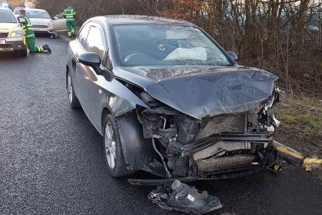 A car damaged in the collision.