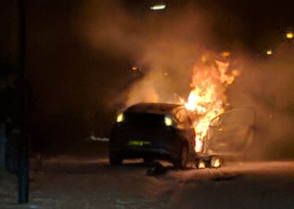 A car burst into flames after hitting a tree on Manor Road Brimington. Picture Julie Adams