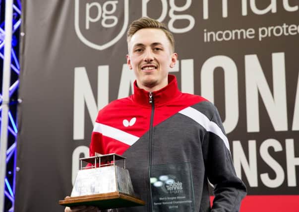 Liam Pitchford with his national title. Pic by Alan Man.