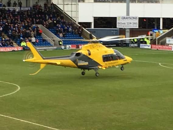 The air ambulance lands on the Proact Stadium pitch. Photo: Chesterfield FC