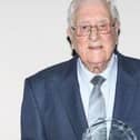 Albert Dooley, 92, with his award.