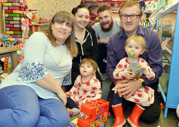 Staff Nikki and Clive Cantrill (front) with Jody and Nathan with children Skylar and Willow.