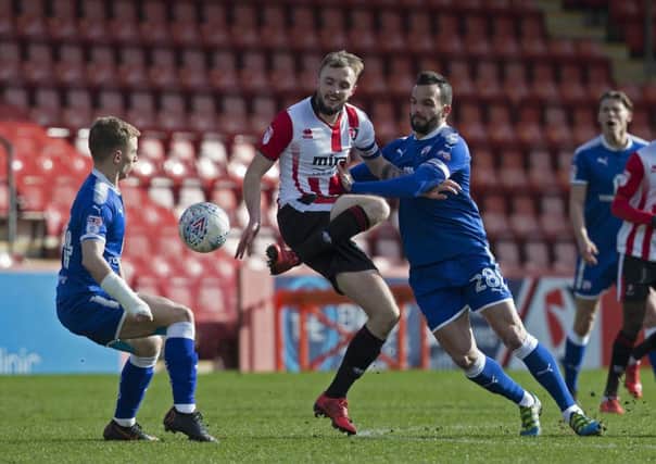 Picture by Gareth Williams/AHPIX.com; Football; Sky Bet League Two; Cheltenham Town v Chesterfield FC; 17/03/2018 KO 15.00; LCI Rail Stadium; copyright picture; Howard Roe/AHPIX.com; Robbie Weir and Andy Kellett combine to steal the ball from Cheltenham's Carl Winchester