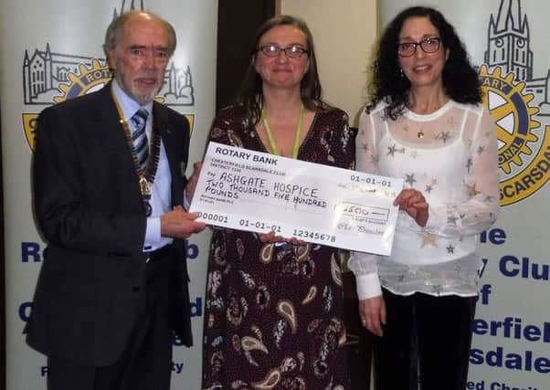 Malcolm Smith, president of the Rotary Club of Chesterfield Scarsdale, presents a cheque for Â£2,500 to Christine Selden and Rachel Betton from 
Ashgate Hospice