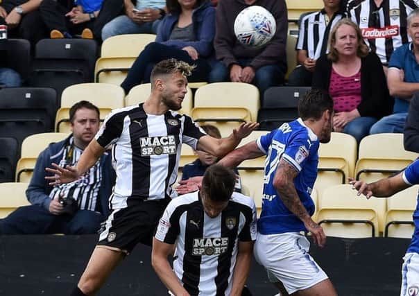 Picture Andrew Roe/AHPIX LTD, Football, EFL Sky Bet League One, Notts County v Chesterfield Town, Meadow Lane, 12/18/17, K.O 3pm

County's Jorge Grant heads in the opening goal

Andrew Roe>>>>>>>07826527594