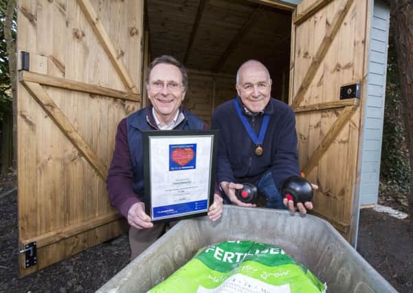 President of the Terminus Bowling Club Tony MacIntyre and green Curator Dr.John Hadfield officially open the new storage shed bought through the Central England Co-operative Community Dividend Award of Â£1300. Photo by Trevor Smith Photography Ltd.