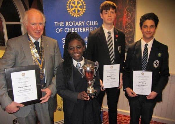 Chesterfield Rotary president Peter Barr presents the  public speaking competition for local secondary schools  cup and certificates to winner Beverlyn Agyemang (St Marys), and the two runners-up Matthew Perryman (Whittington Green) and Anton Causey (St Marys).