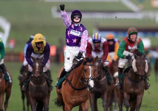 Bridget Andrews celebrates on Mohaayed after she became one of four winning female jockeys at this year's Cheltenham Festival. (PHOTO BY: Mike Egerton/PA Wire/PA Images).