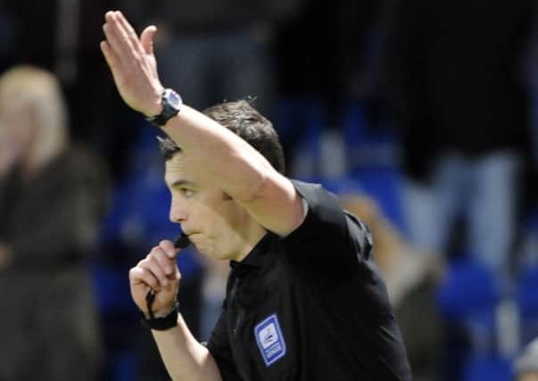 Sky Bet League Two Football - Chesterfield FC v Bury FC 
Referee Tony Harrington allows the third goal after speaking to the linesman