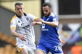 ChesterfieldÃ¢Â¬"s Robbie Weir competes for the ball with Port Vale's Michael Tonge: Picture by Steve Flynn/AHPIX.com, Football: Skybet League Two match Port Vale -V- Chesterfield at Vale Park, Burslem, Staffordshire, England on copyright picture Howard Roe 07973 739229