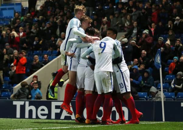 Arvin Appiah of England U17 celebrates scoring his goal to make it 2-2 with his team-mates during the England v Portugal FA Under 17 international football friendly tournament at Chesterfield FC, Chesterfield, UK - 8th Nov 2017

Photo: Matt West for FA