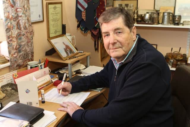 Tony Rogers in his office, surrounded by memories from his decades in politics. Picture by Jason Chadwick.